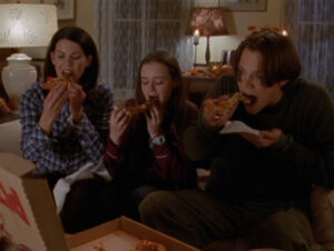 Gilmore Girls eating pizza