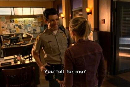 Veronica Mars still of Leo and Veronica with text superimposed "You fell for me?"